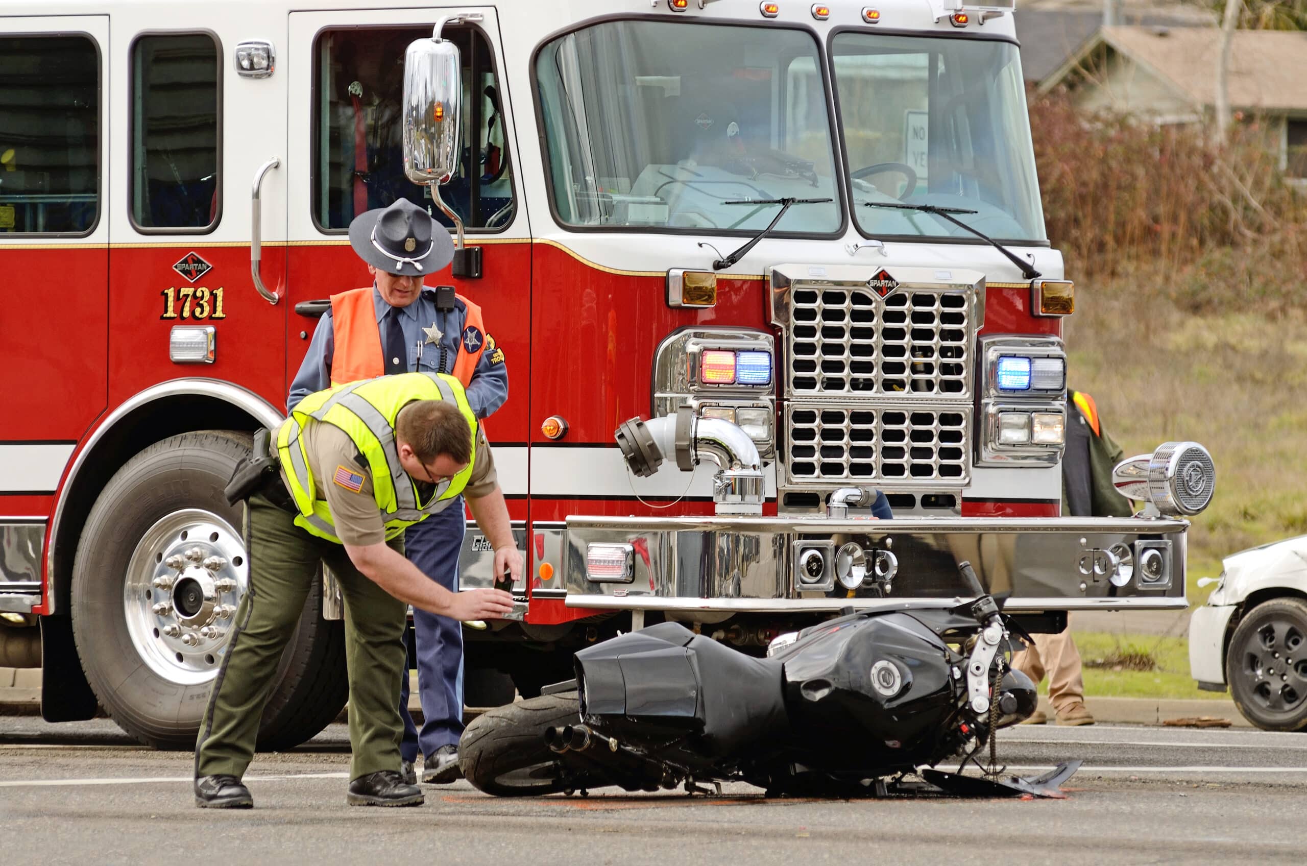 Commercial trucking accident with a motorcycle. Paramedics at the scene. SHK Law